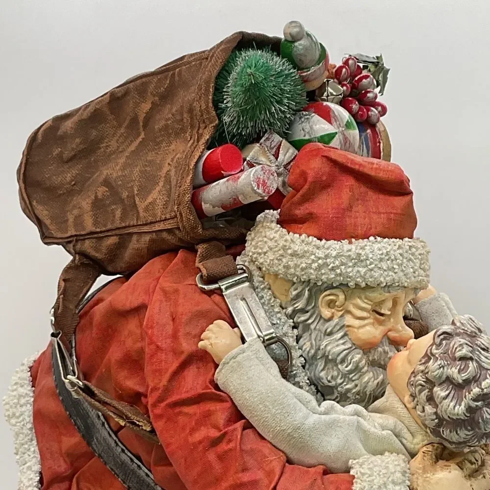 Clothtique Santa and Child Sculpture - Saturday Evening Post
